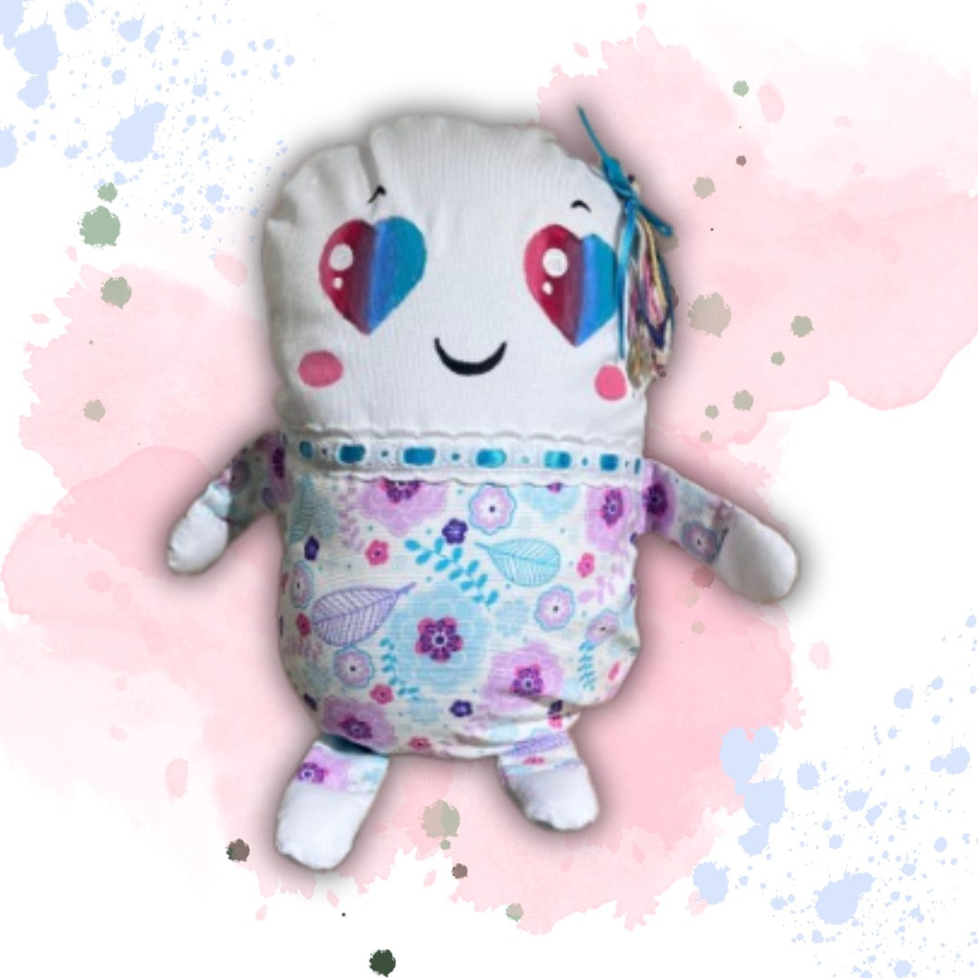 almohada muñeca de tela ojos corazon